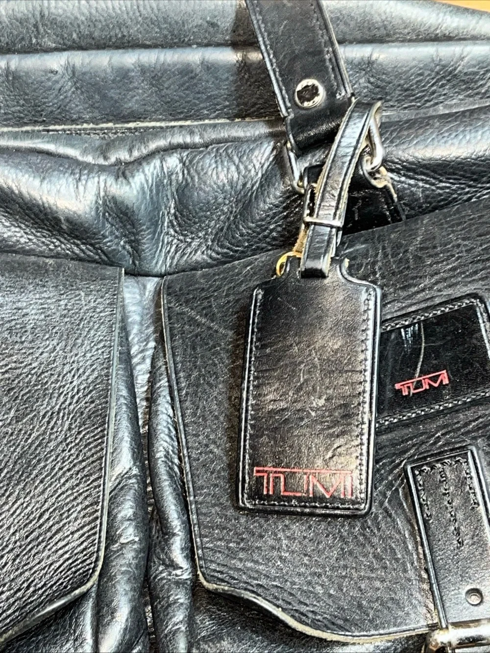 Tumi Black Leather Men's Briefcase with Dual Front Pockets
